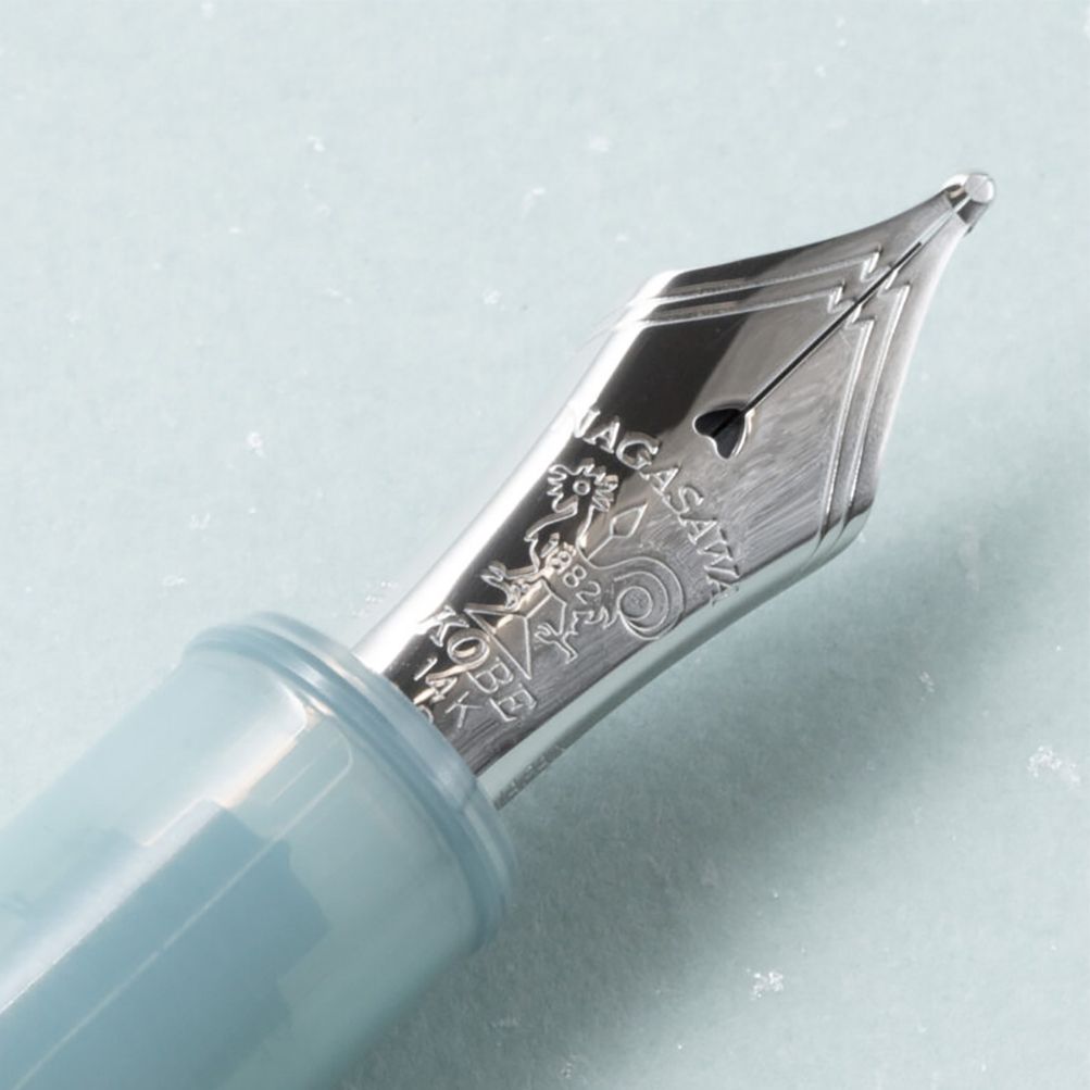 Kobe Hashio Cider nib close up showing famous icon rooster weathervane