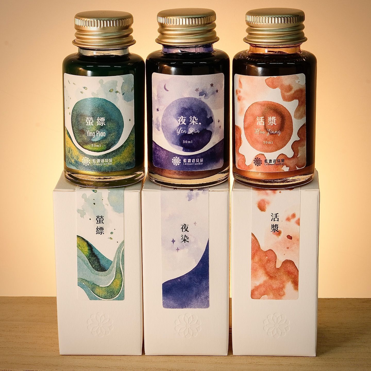 Three Lennon Toolbar ink bottles