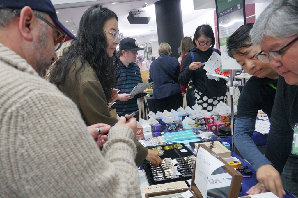 Shopping at an exhibitor table