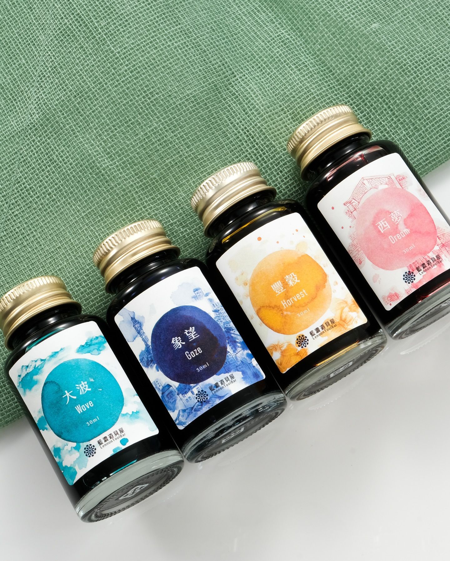 Four Lennon Toolbar ink bottles