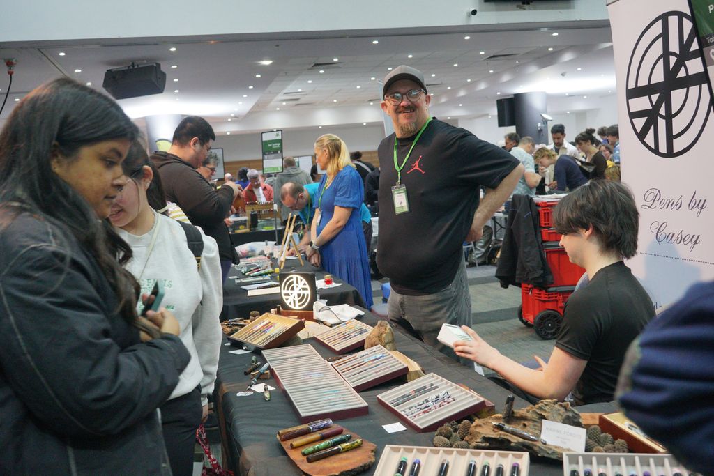 A happy Casey at the Pens by Casey table