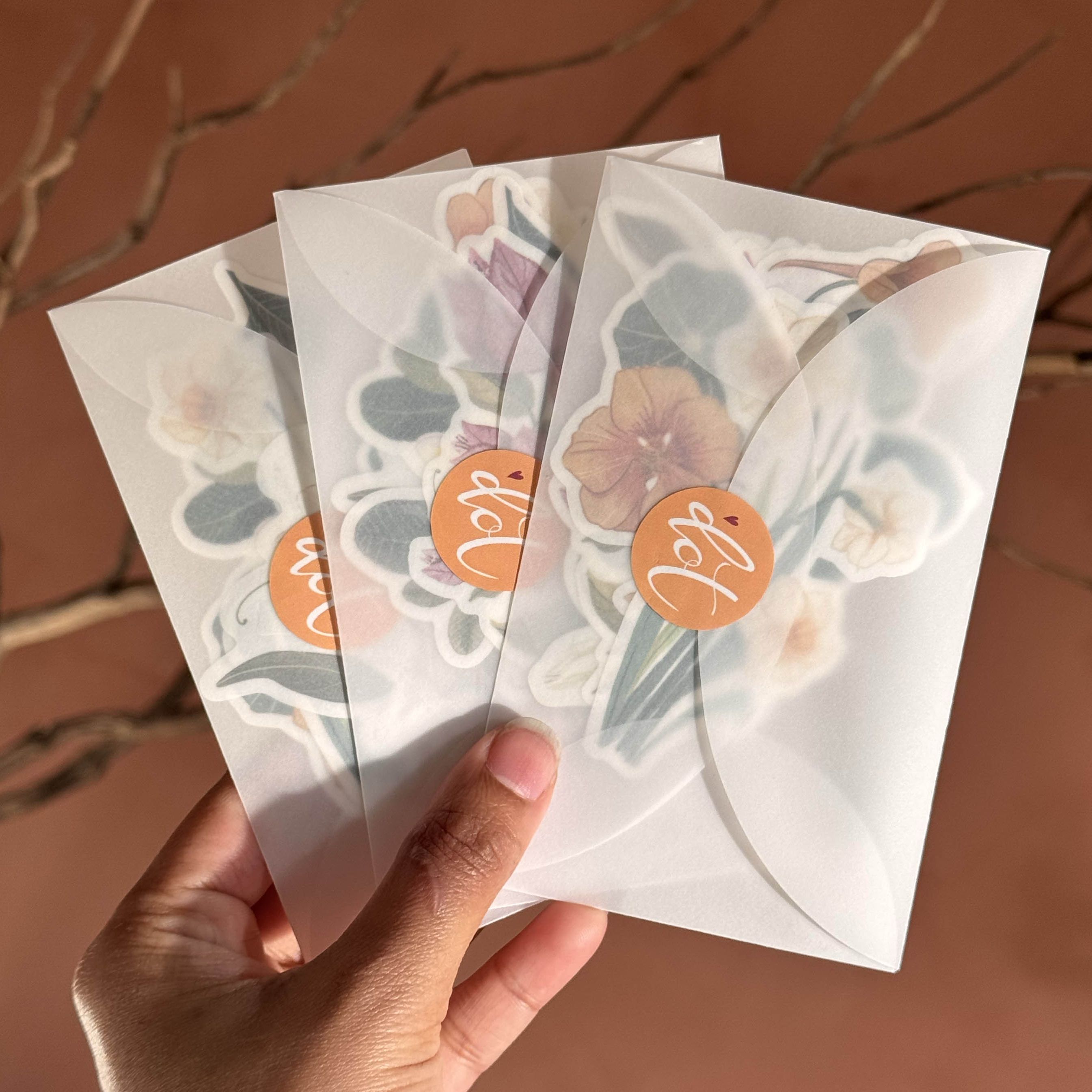 flower themed stickers in see through envelopes