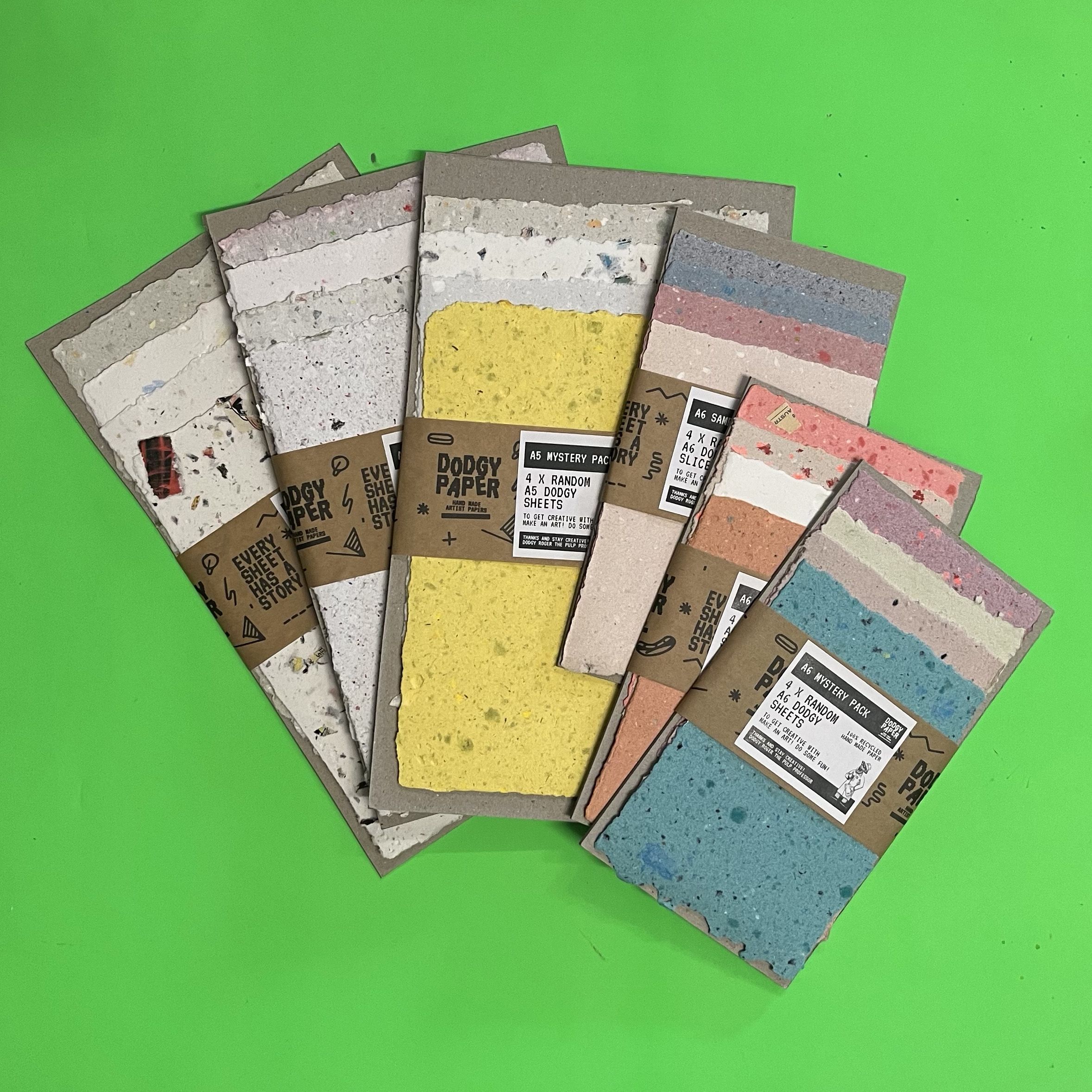 Packs of recycled paper in different sizes and colours