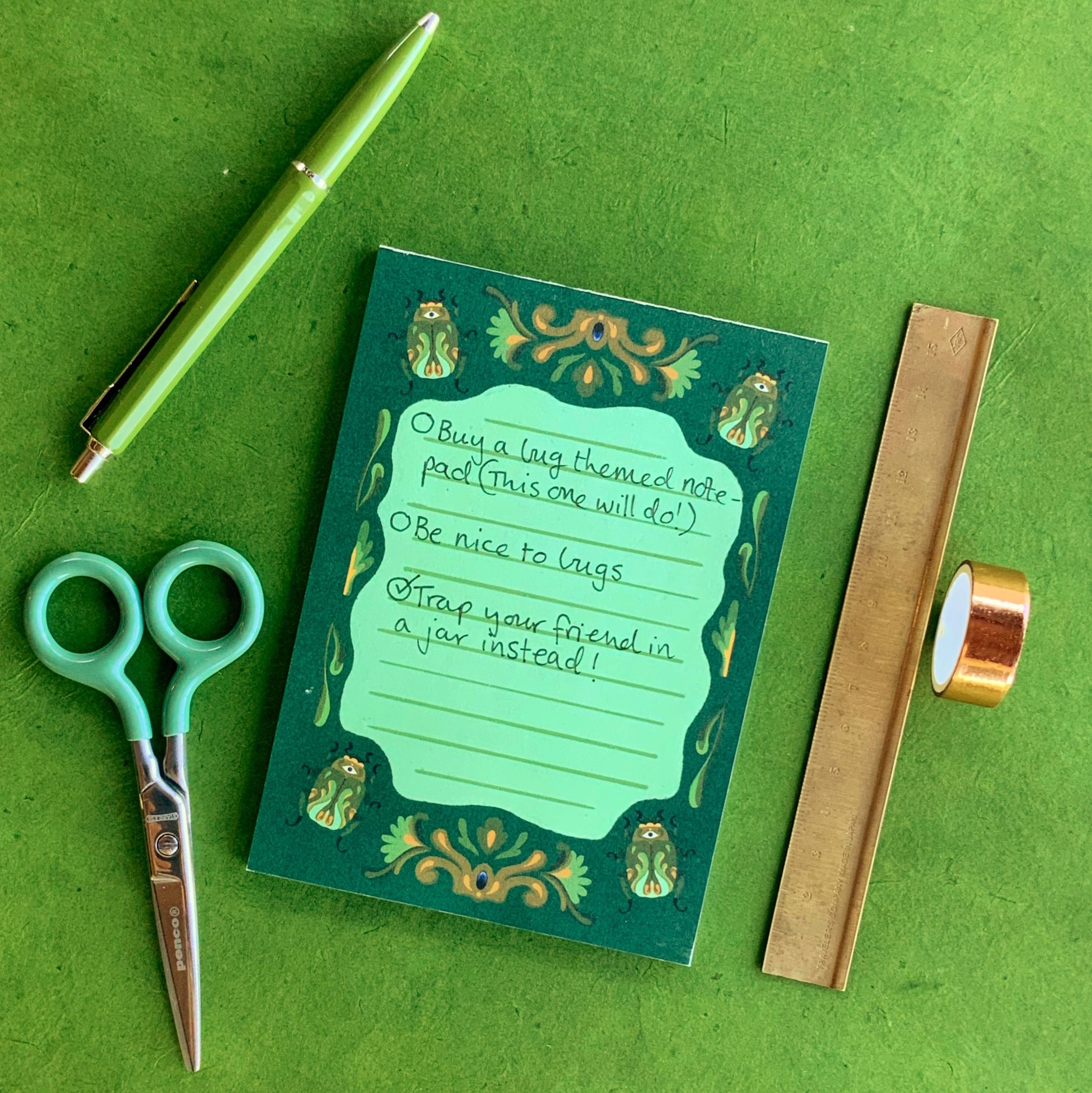 Green scarab beetle themed note pad