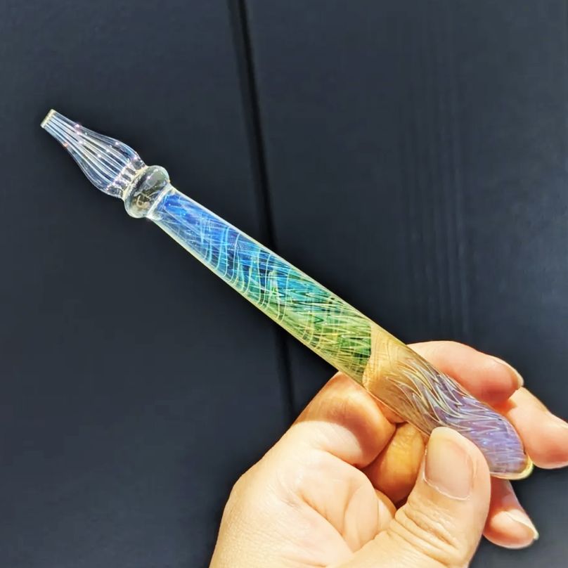 Hanabi Glass Studio Borosilicate glass pen clear with yellow and blue spiral fire pattern