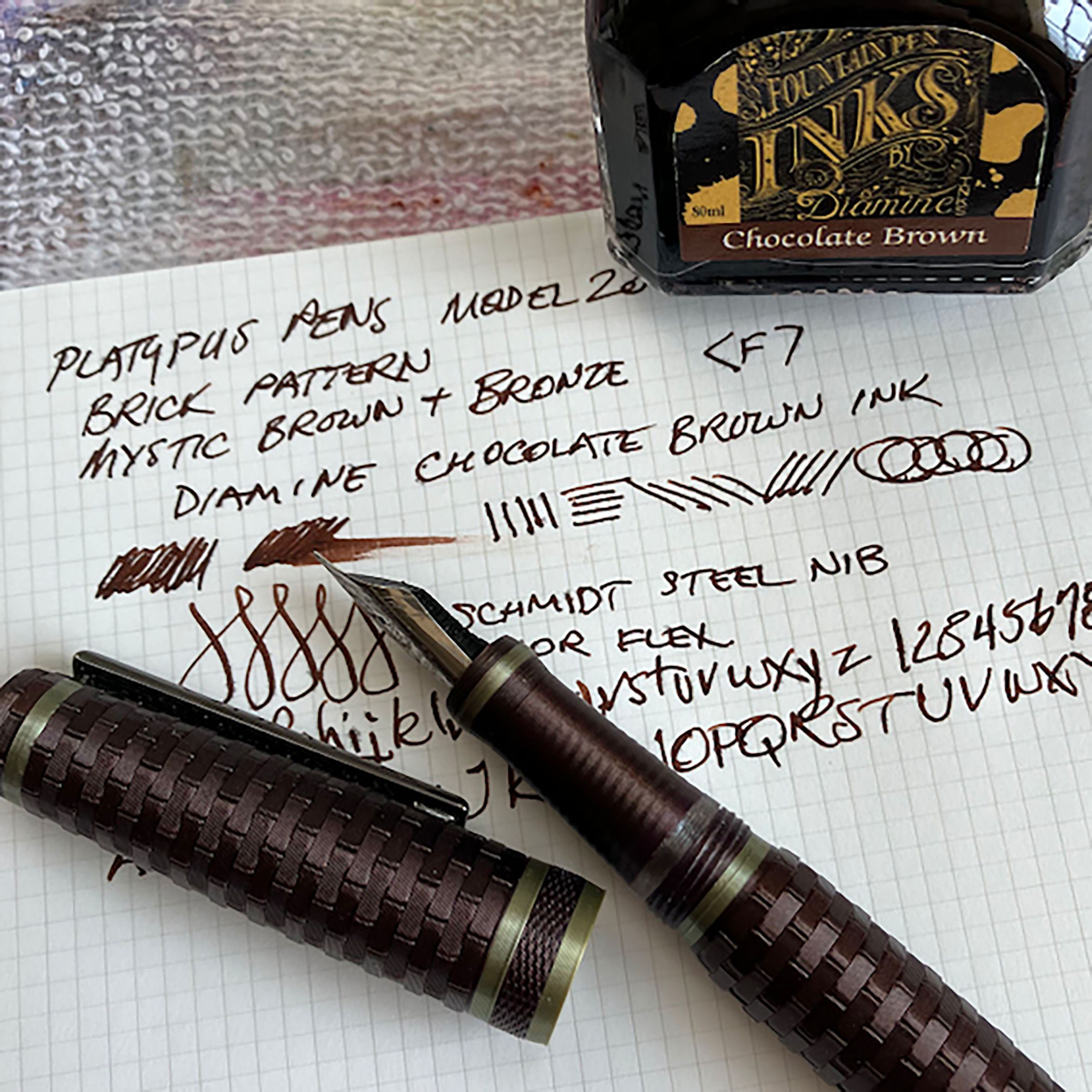 Platypus pen, Diamine Chocolate Bronw ink, and ink swatches