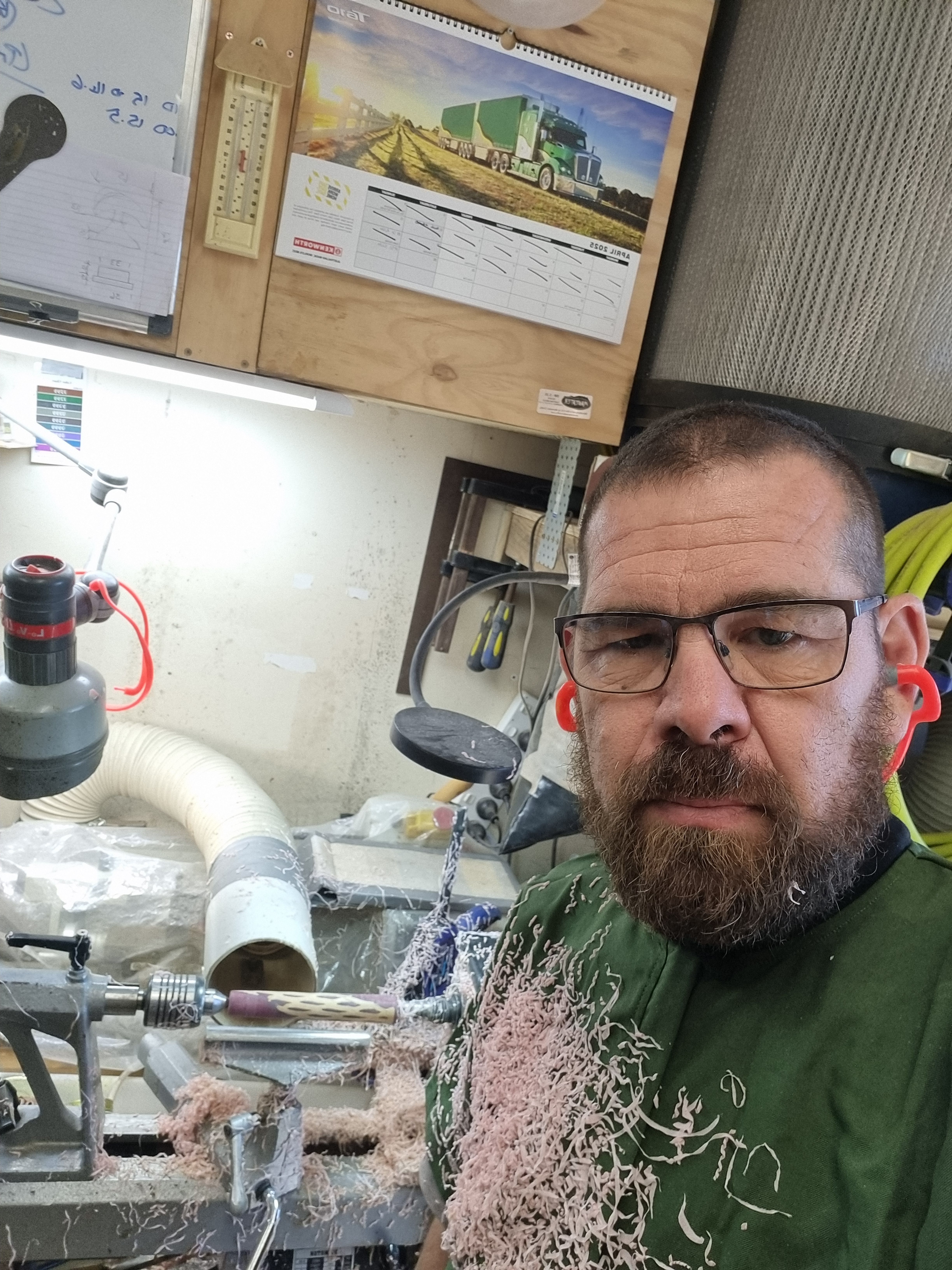 Martin Ganter in his workshop covered with lathe shavings