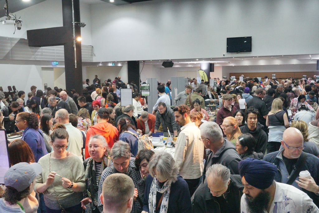 A view of the hall, packed with people