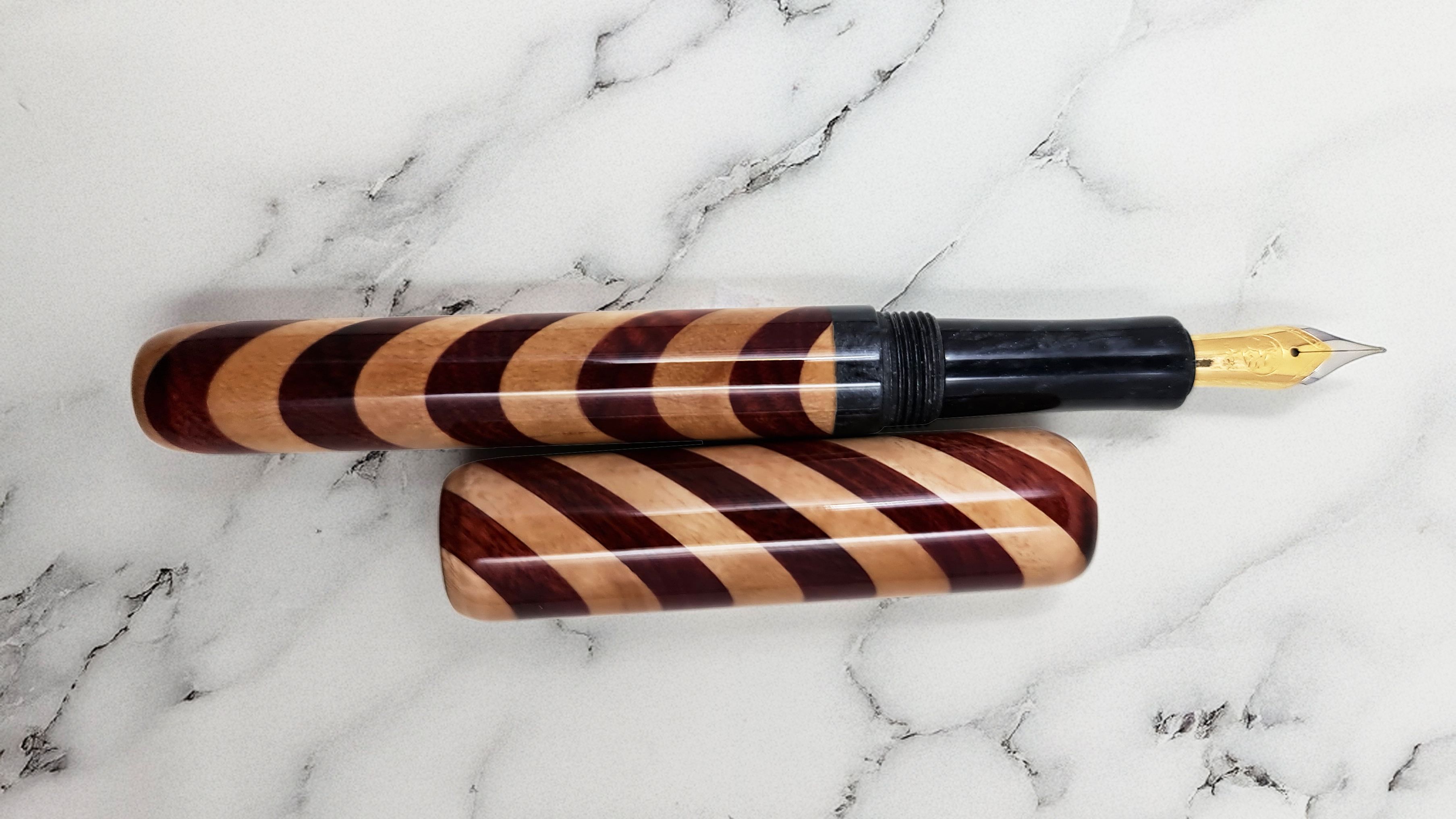 Wooden caramel and chocolate stripy spiral fountain pen