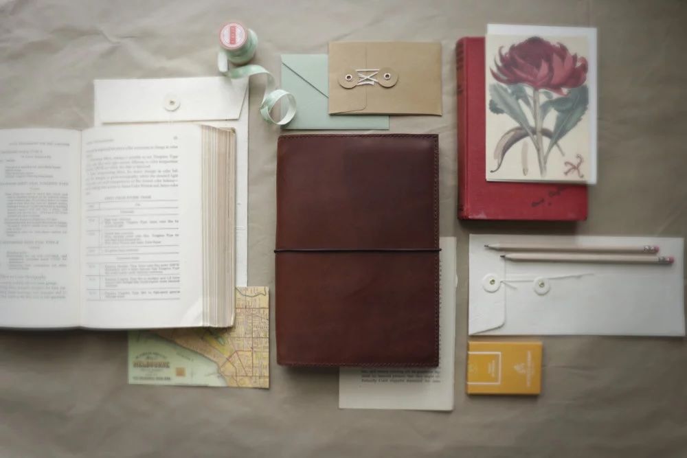 Leather notebook cover and various accoutrement