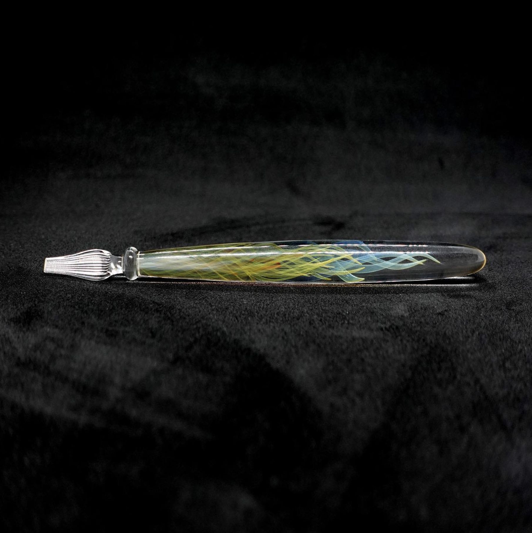 Borosilicate glass dip pen with blue and yellow double helix spirals on black
