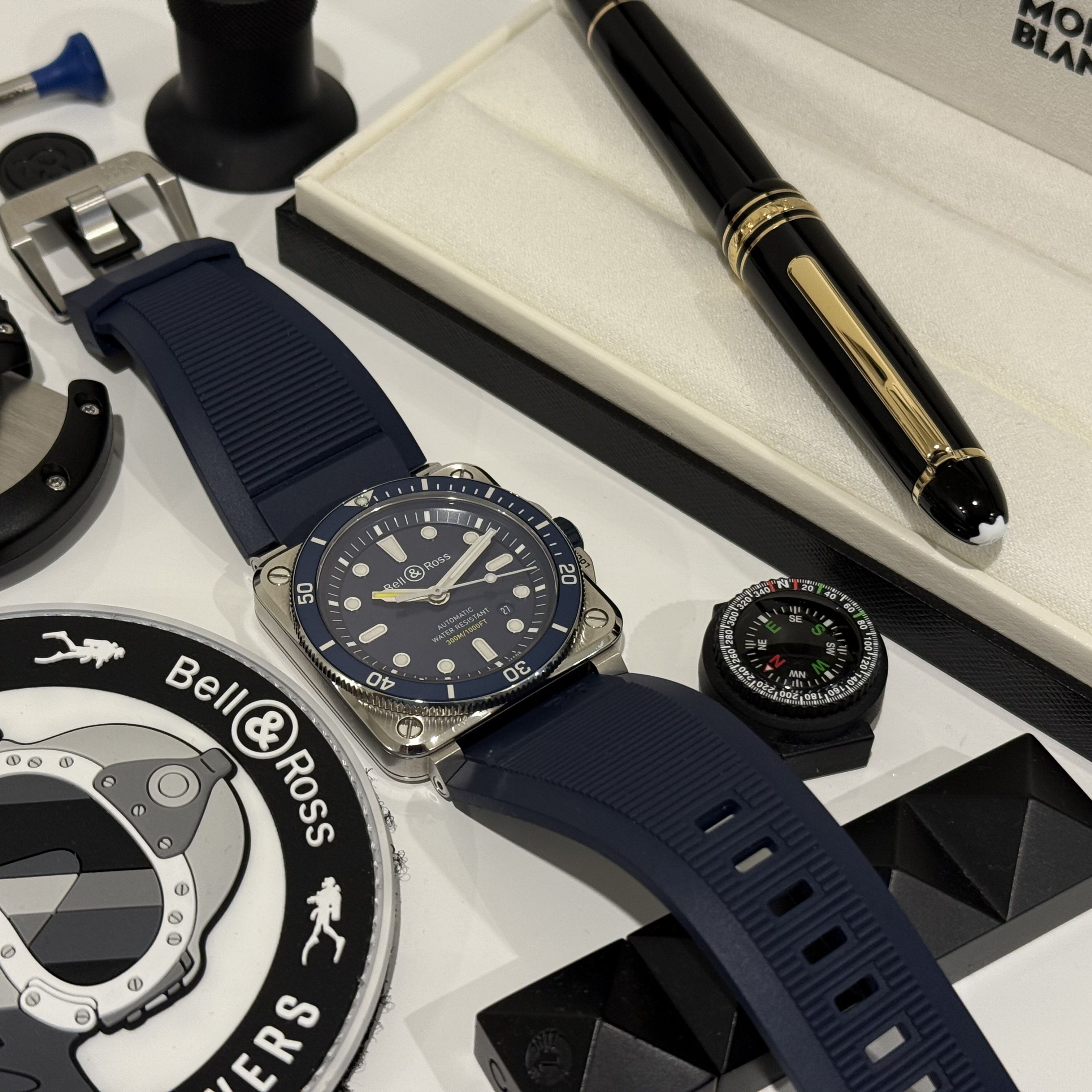 watch, strap, pen, sticker, compas