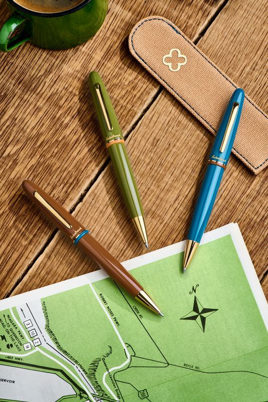 Three Esterbrook pens on a map