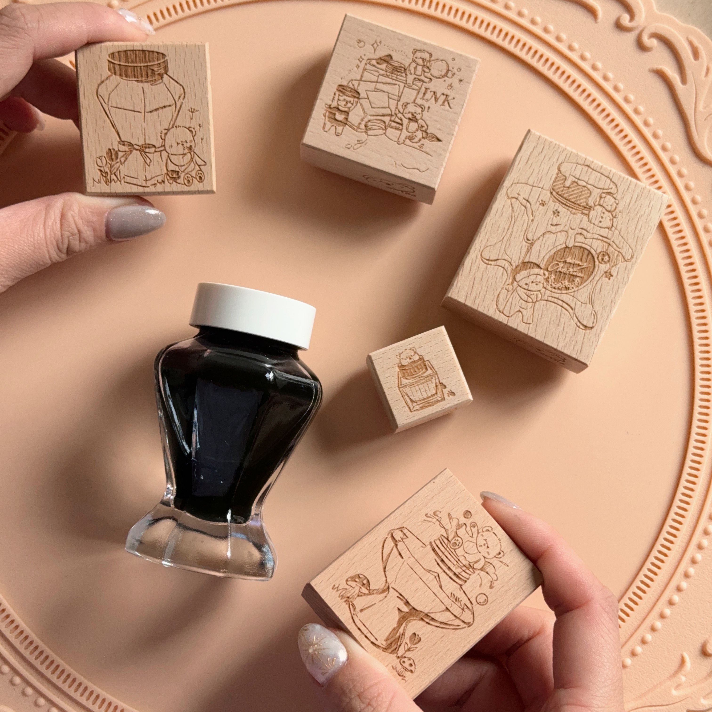 Wooden rubber stamps and Sailor Vase fountain pen ink bottle