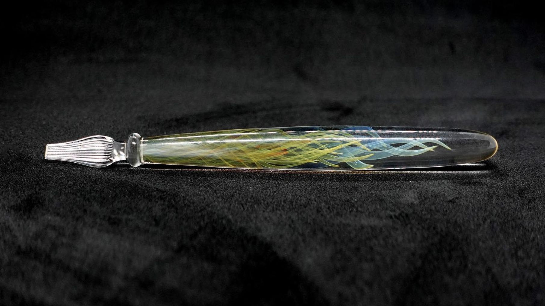Borosilicate glass dip pen with blue and yellow double helix spirals on black
