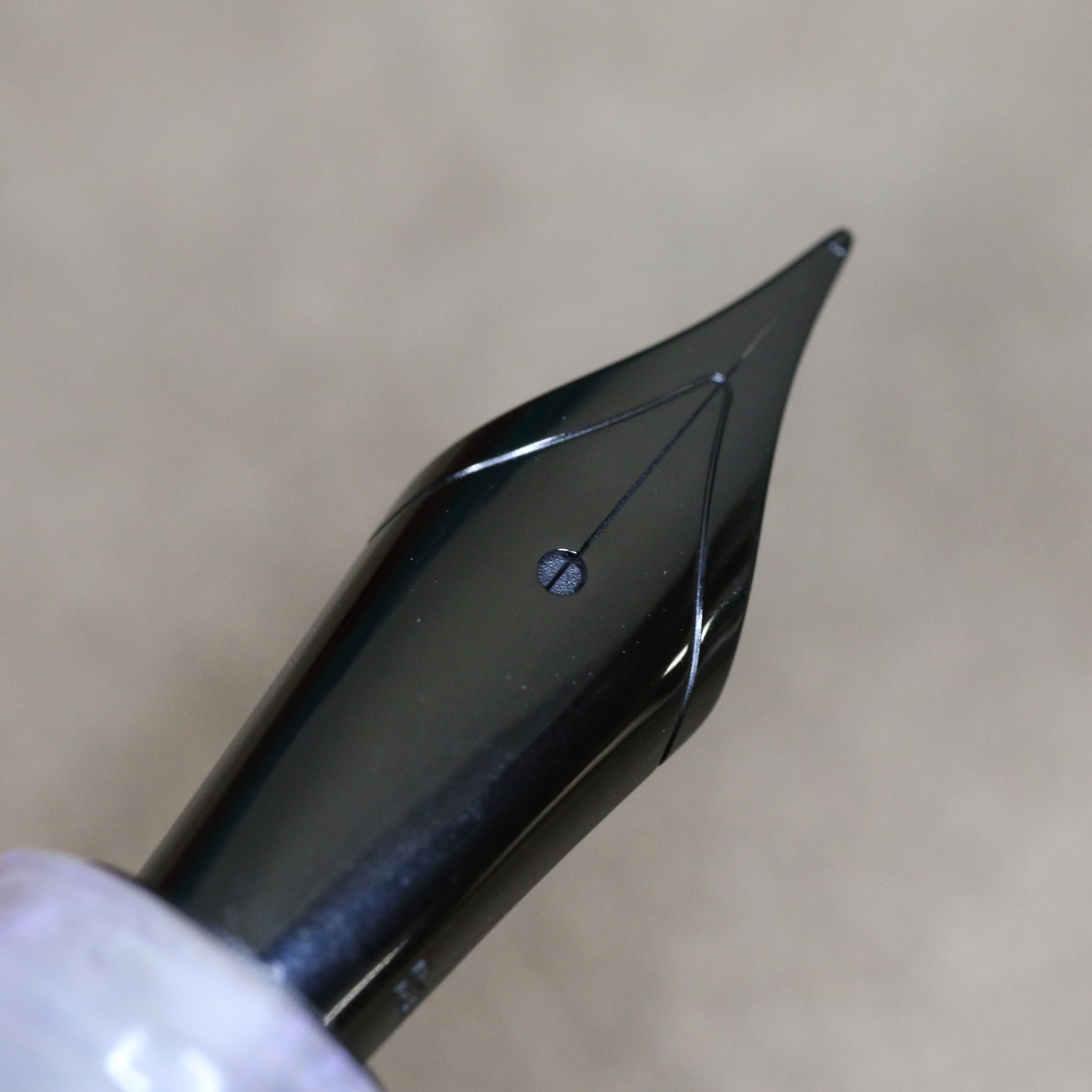 Fountain pen with a square black nib